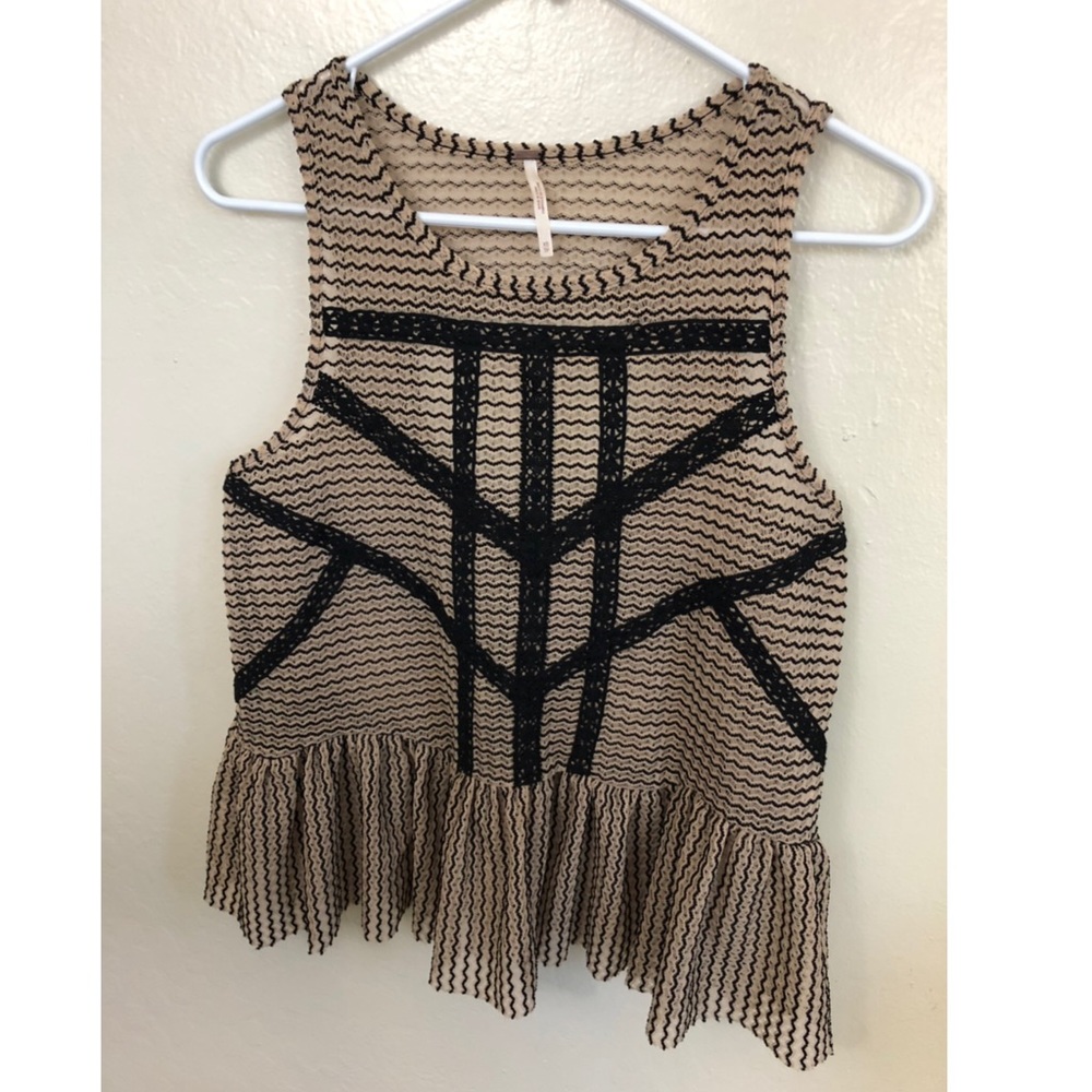 Sleeveless tank with peplum